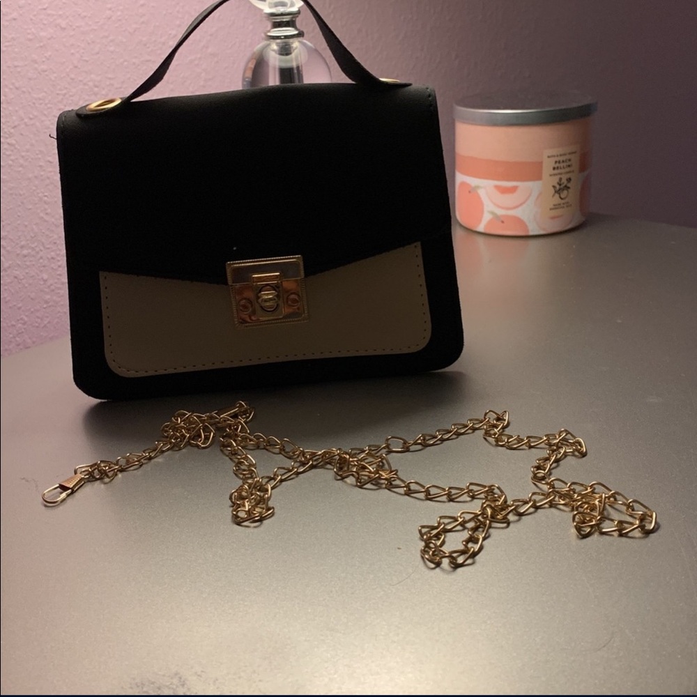 A small purse. Mostly for accessory. Black with some crème. - Picture 3 of 5